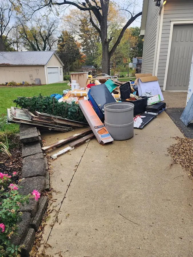 Dumpster being loaded with debris for 30 Yard Dumpster Rental in Willingboro